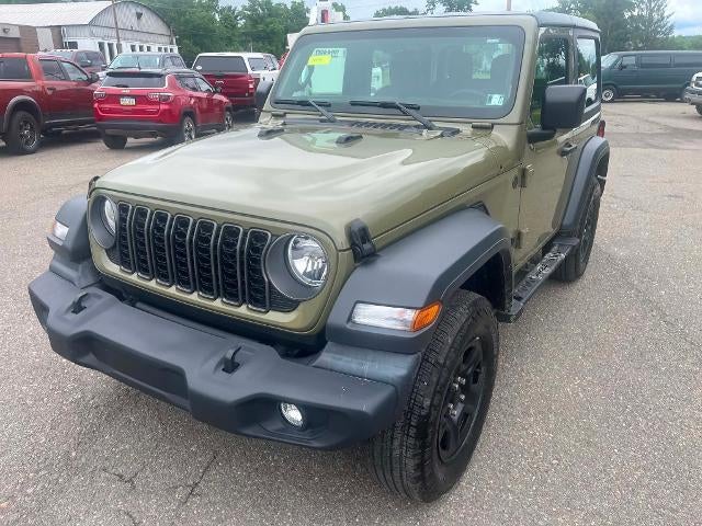 2025 Jeep Wrangler Sport in Green — front three-quarter view