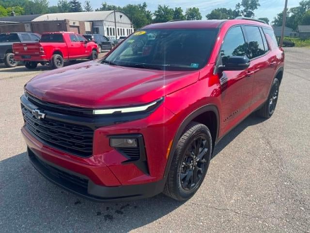 2026 Chevrolet Traverse LT in Radiant Red Tintcoat — front three-quarter view